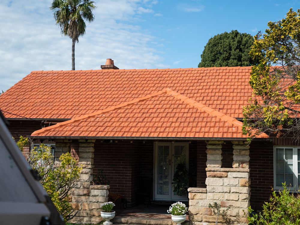 Brick bungalow with a freshly restored tile roof